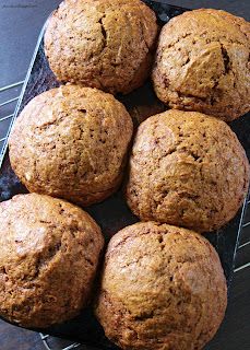 six muffins sitting on top of a cooling rack