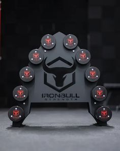 the ironbull logo is surrounded by red and black lights