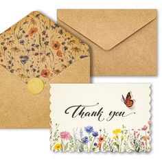 two envelopes, one with a thank you card and the other with a butterfly on it