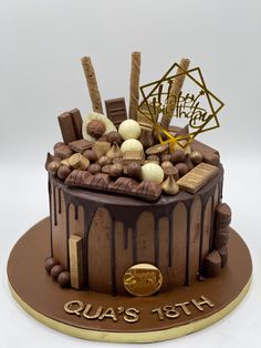 a cake with chocolate icing and decorations on top