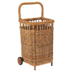 a wicker basket with wheels on a white background