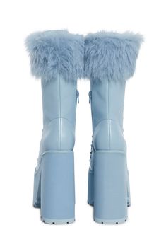 Look cute at the ski lodge with these boots that have a vegan leather construction, a faux fur trim, platform treaded soles, block heels, a front-lace-up design, and side zipper closures. Light Blue Heels, Fur Leg Warmers, Shoe Pics, Vegan Leather Boots, Snow Bunny, Sugar Thrillz, Ski Lodge, Blue Boots, Blue Heels