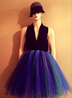 "Make a statement with this peacock-inspired tutu skirt.  This skirt is perfect for the adult princess!  Made with the finest purple, blue, turquoise, and green tulle, this skirt is guaranteed to steal the show!  Great for weddings,  holiday parties, birthdays, and more!  Order yours today!    This listing is for our custom MADE-TO-ORDER, Women's Peacock Tutu Skirt\".  Make times are between 7-14 business days plus shipping time.  Please order in advance to ensure that your order arrives in time Peacock Tutu, Green Tulle, Bleu Turquoise, Tutu Skirt, Blue Turquoise, Holiday Parties, Ball Gowns, Dress Outfits, Turquoise