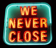 a neon sign that says we never close