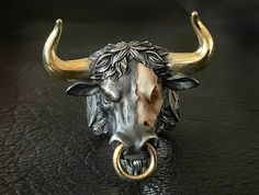 🔱 Embrace the strength, power, and spiritual guidance of the Hell Bull ring. Rise up to any challenge with this extraordinary piece of jewelry loaded with unapologetic Mortis Ores DNA and created with meticulous craftmanship. Designed to honor the fight through any obstacles, this Hell Bull ring will give you the bullish spirit to rise and win it head on. Make it a symbol of your strength and wear it as a statement! 🔱 The ring weighs at approximately 75 grams of 925 sterling silver with 22K go Black Horns, Warrior Ring, Bull Ring, Exotic Jewelry, Animal Bones, Bull Skulls, Bespoke Jewellery, Spiritual Guidance, Engraved Jewelry