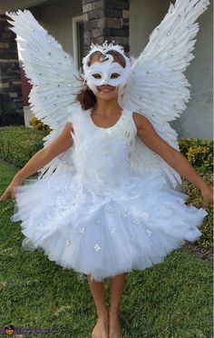 This is my daughter Zia, she is wearing a Swan costume created by me. I bought the wings, leotard, and mask on Amazon, and added rhinestones, lace, lights and feathers purchased from Hobby lobby. We got the idea from a friend on facebook. The tutu... Photo 2 of 2. Swan Lake Costumes, Swan Costume, Princess Costume Kids, Halloween Costumes 2016, Homemade Costume, Costume Works, Angel Costume, Animal Costumes, Halloween Costume Contest