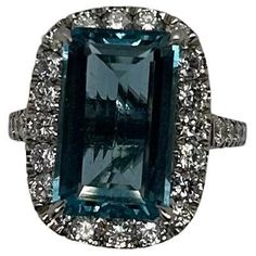 1950' Platinum aquamarine diamond ring. aquamarine approx 11.0 cts Diamond approx 2.5 cts F-G color VS. ring size :w/ring guard 3.25, without ring guard approx 4.25 Luxury Aquamarine Diamond Ring With Diamond Accents, Luxury Aquamarine Diamond Ring With Emerald Cut, Luxury Blue Aquamarine Diamond Ring, Blue Aquamarine Emerald-cut Diamond Ring, Luxury Aquamarine Emerald-cut Rings, Ring Guard, Aquamarine Ring, Cocktail Rings, Aquamarine