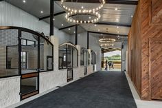 A Modern Metal Masterpiece - STABLE STYLE Luxury Horse Stalls, Beautiful Stables, Gooseneck Lighting, Barn Windows