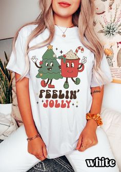 "Comfort Colors Christmas Shirt, Christmas Shirts for Women, Christmas Tree, Christmas T-Shirt, Merry Christmas Shirt, Cute Christmas Gift Save by bundling! We offer these great discounts on bulk orders: - 25% on 5+ items (use code BUNDLE5) - 30% on 10+ items (use code BUNDLE10) - 35% on 20+ items (use code BUNDLE20) ➭ How to Order 1. Choose your shirt size & color options. 2. Select the quantity. 3. Click \"Add to Cart.\" 4. Listen for a knock at your door! ➭ Care Instructions Wash your shirt i Cute Christmas Tshirts, Casual White T-shirt For Holiday, White Casual Christmas T-shirt, Casual White Christmas T-shirt, White Casual T-shirt For Christmas, Casual White T-shirt For Christmas, Holiday White T-shirt With Graphic Print, Funny Holiday T-shirt With Graphic Print, White Graphic Print T-shirt For The Holiday