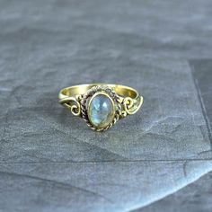 Labradorite Ring/Handmade Ring/Dainty Ring/Unique Ring/Statement Ring/Women Ring/Vintage Ring/Boho Ring/Promise Ring/Anniversary gift/Gifts For Her METAL :- Brass FINISH :- gold STONE :- Labradorite Ring can be customized on request and gemstone can be made to any gemstone you want. Same Design Ring Are Upload With Any Gemstone. Please Visit Our Shop to View Complete Collection. If You Need Faster Shipping, Please Contact us Please Make Sure to Include The Correct Address During Before Order. Yo Heirloom Style Handmade Gold Moonstone Ring, Handmade Heirloom Gold Moonstone Ring, Bohemian Opal Birthstone Ring, Heirloom Handmade Gold Moonstone Ring, Bohemian Adjustable Moonstone Birthstone Ring, Bohemian Opal Promise Ring, Bohemian Opal Promise Ring As Birthstone, Bohemian Opal Birthstone Promise Ring, Bohemian Opal Promise Ring With Birthstone