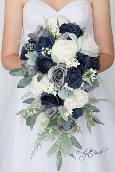 a bridal bouquet with blue and white flowers