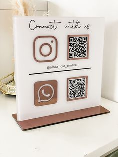 a close up of a card on a table with qrw and qr