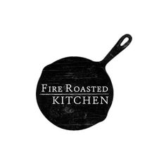 a black frying pan with the words fire roasted kitchen on it