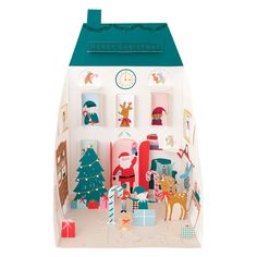 an open christmas gift box with paper cutouts and decorations on the inside, including santa's sleigh