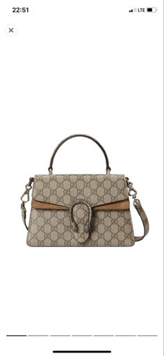 Amazing looking and of high quality Gucci Top Handle Bag With Gold-tone Hardware, Gucci Bag With Gold-tone Hardware And Top Handle, Gucci Crossbody Satchel, Gucci Top Handle Bag With Logo, Gucci Top Handle Bag With Branded Hardware, Gucci Crossbody Satchel With Top Carry Handle, High-end Coated Canvas Satchel With Top Handle, Gucci Top Handle Shoulder Bag, Designer Coated Canvas Satchel With Top Handle