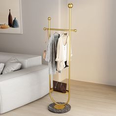 a clothes rack in the corner of a living room