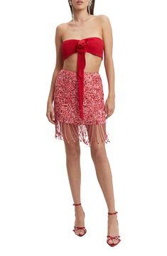 Beaded fringe sways with every step you take in this party-ready miniskirt covered in sparkly sequins. 14" length Exposed back-zip closure Partially lined 100% polyester Hand wash, line dry Imported Summer Sequin Dress With Fringe, Summer Mini Sequin Dress With Beaded Fringe, Summer Beaded Fringe Sequin Mini Dress, Summer Party Sequin Dress With Rhinestone Fringe, Summer Evening Mini Skirt With Contrast Sequin, Spring Mini Skirt With Rhinestone Fringe For Night Out, Spring Rhinestone Fringe Mini Skirt For Night Out, Spring Party Mini Skirt With Rhinestone Fringe, Flirty Sequined Mini Skirt For Party