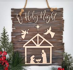 a wooden sign that says, merry night with a nativity scene