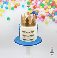 a birthday cake with a crown on top