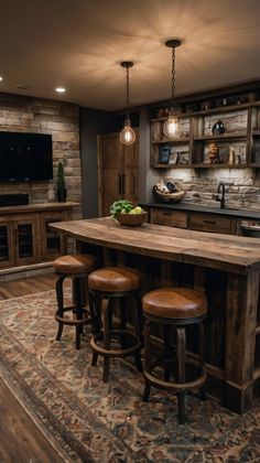 a kitchen island with stools in front of it