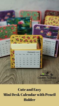 mini desk calendar with pencil holder made out of colored paper and magnets on top