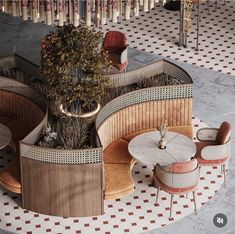 the circular seating area is surrounded by tables and chairs