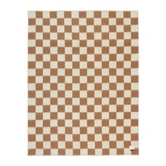 a brown and white checkered rug on a white background