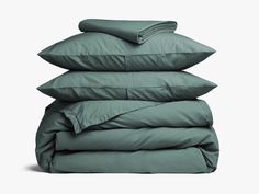 four pillows stacked on top of each other