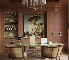 a dining room table with two chairs and a painting on the wall