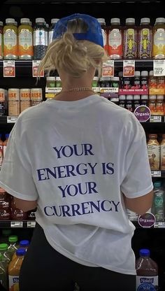 Elevate your wardrobe with the "Your Energy Is Your Currency" t-shirt, a perfect blend of Y2K and 2000s-inspired fashion. This tee carries an inspirational message that resonates with the Gen Z mindset, focusing on manifestation and self-love. Whether you're all about positive vibes or just need a daily reminder of your worth, this tee is both stylish and empowering. Perfect as a Gift For Her, it's the ideal choice for those who value energy, motivation, and a chic aesthetic. Make every outfit c Your Energy Is Your Currency, Streetwear Shirts, Positive Shirt, Quote Tees, Baby T Shirts, Gen Z, Inspirational Shirt, Gaming Clothes, Love T Shirt