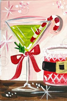 a painting of a christmas martini with a candy cane