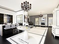 a large room with black and white decor