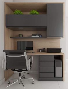 an office with a desk, chair and shelves in the wall above it is a planter that has been placed on top