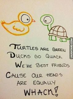 two little turtles are sitting next to each other with words written on the wall behind them