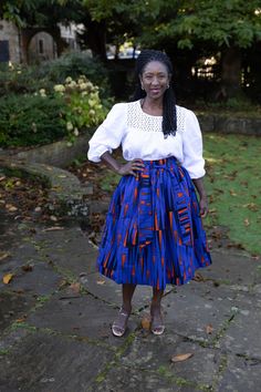 Infuse your wardrobe with vibrant flair with our African print midi skirt.  This skirt features a belted waist and convenient pockets for added functionality. Features: * 100% Cotton, no stretch * Full Skirt with pockets * Fully lined * Model is 5ft 6" tall and is wearing a UK 12/USA 8/EU 40 Measurements Size 10: Waist 30, Length 30 Size 12: Waist 32, Length 31 Size 14: Waist 34, Length 31 Size 16: Waist 36, Length 31 Size  18: Waist 38, Length 31 Size 20: Waist 40, Length 31 African Print Midi Skirt, Belted Skirt, Skirt Belt, Skirt With Pockets, Womens Skirts, Skirts With Pockets, African Clothing, Full Skirt, African Print