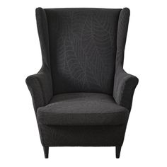 a black chair with a leaf pattern on it