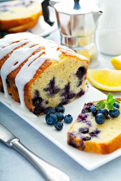 a loaf of lemon blueberry bread on a plate