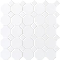 a white tile pattern that looks like hexagonal tiles