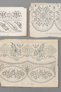 three pieces of embroidered cloth with designs on them