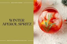 winter aperol spritz with oranges and rosemary garnish in glasses