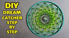 a green circular object with the words diy dream catcher step by step