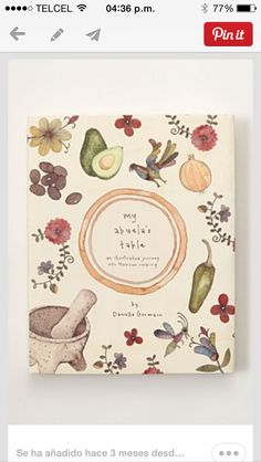 an illustrated book with flowers and vegetables on it