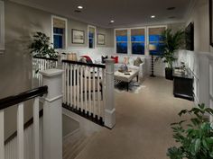 a living room filled with furniture and a fire place