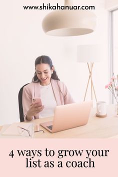 a woman sitting at a desk looking at her phone and laptop with the text 4 ways to grow your list as a coach