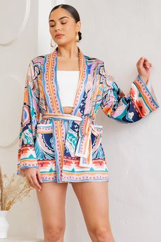 Description Open front printed kimono with long sleeves Self tie belt Tonal lined interior Detail 100% Polyester Imported Size & Fit Model is 5'7", and wears size small Printed Kimono, Long Sleeve Jacket, Print Kimonos, Scarf Set, Sleeve Jacket, Long Sleeves Jacket, Tie Belt, Front Open, Custom Fit