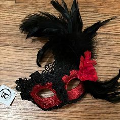 Masquerade Mask With Red Glitter, Black Lace, Red Flower, And Black Feathers. Nwt, Never Worn, Just Can’t Return It! Masquerade Mask On Stick, Black And Red Quince Dress, Red And Black Quinceanera Theme, Red And Black Masquerade Mask, Gold Sweet 16 Dresses, Masquerade Party Centerpieces, Masquerade Party Themes, Masquerade Prom