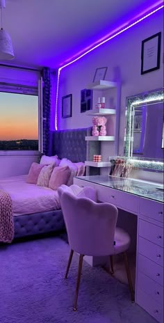 a bedroom with purple lighting and a large window