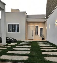 a house that has grass in front of it