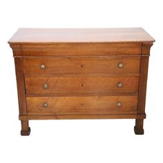 an old wooden chest with three drawers on one side and two knobs on the other