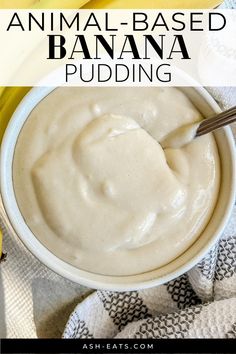 a bowl filled with banana pudding on top of a white table cloth next to bananas